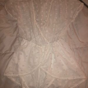 White romper with dotted pattern